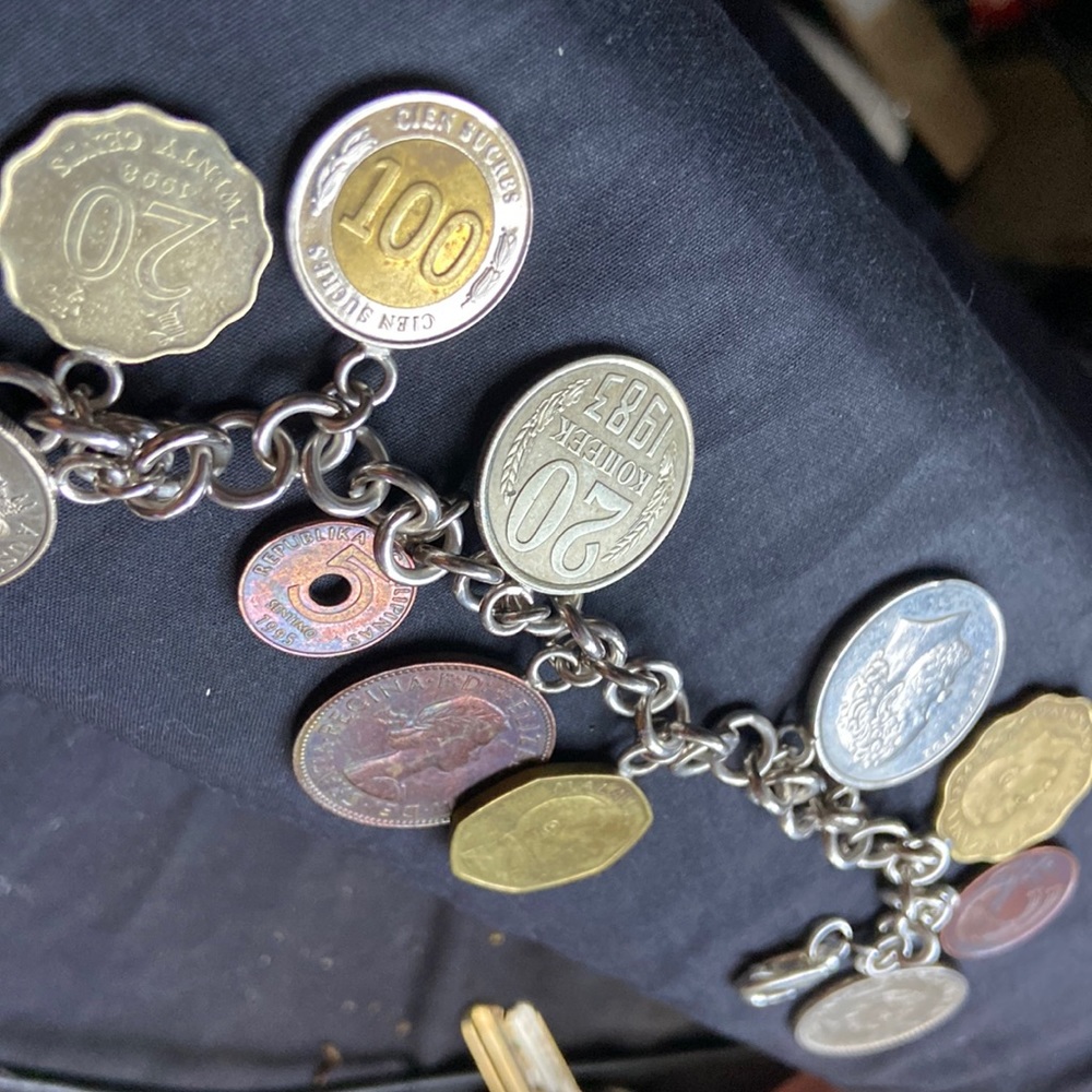 925 sterling silver coin charm bracelet 11 of them on here milor bracelet